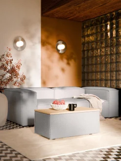 Reposapiés puf en tejido bouclé con espacio de almacenamiento Lennon