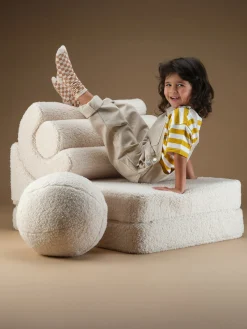 Silla infantil plegable artesanal de borreguillo Flipster