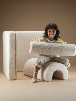 Silla infantil plegable artesanal de borreguillo Flipster