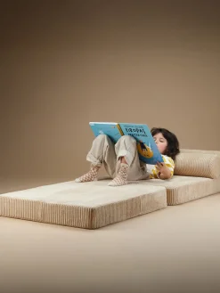 Silla infantil plegable artesanal de borreguillo Flipster