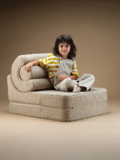 Silla infantil plegable artesanal de borreguillo Flipster