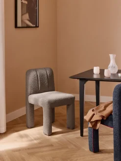 Silla tapizada en tejido bouclé Lukas