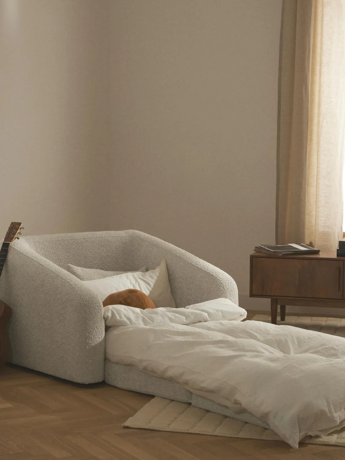 Sillón cama de borreguillo bouclé Eliot