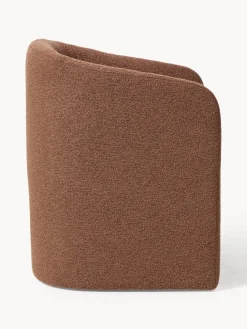 Sillón con reposabrazos en tejido bouclé Mairo