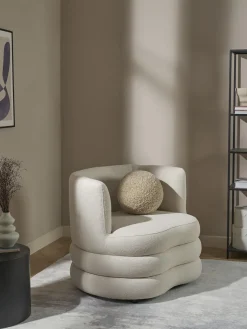 Sillón en tejido bouclé de diseño Solomon