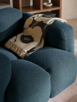 Sillón en tejido bouclé Tayla