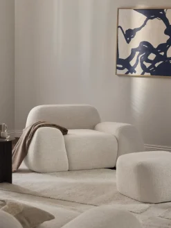 Sillón en tejido bouclé Wolke