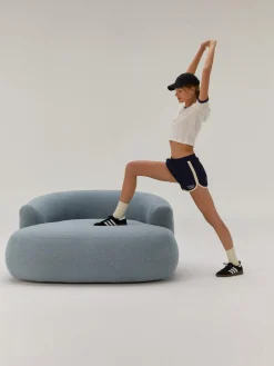 Sillón lounge grande en tejido bouclé Sofia