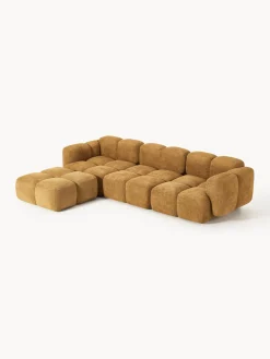 Sofá modular de borreguillo bouclé con reposapiés izquierdo/derecho Tayla (4 plazas)