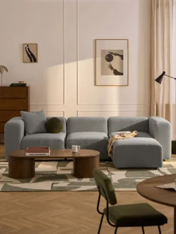 Sofá modular en tejido bouclé con reposapiés izquierdo/derecho Lena (4 plazas)