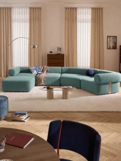 Sofá modular grande en tejido bouclé con reposapiés Anton (izquierda/derecha)