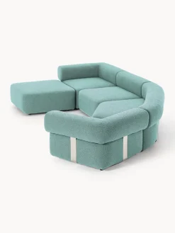 Sofá modular grande en tejido bouclé con reposapiés Anton (izquierda/derecha)