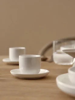 Tazas de café espresso de porcelana con platitos Nessa, 4 uds.