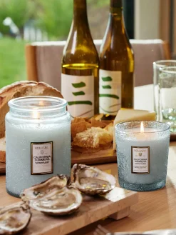 Vela perfumada artesanal California Summers (sal marina, vainilla cálida, madera de teca)