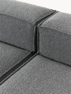 Westwing | Crosby Studios, sillón en tejido bouclé con reposabrazos anchos Lennon